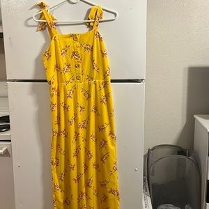 Yellow jumper with cherry blossom branches. I cotton material.